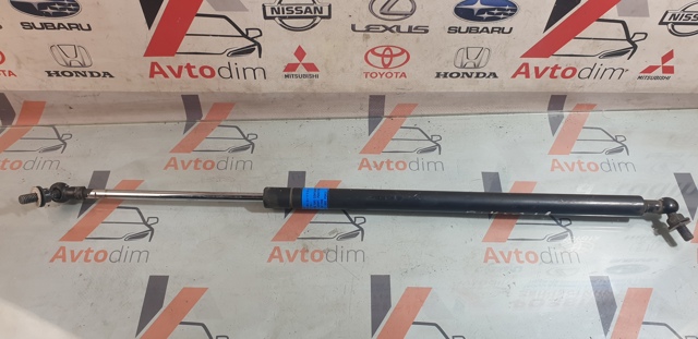 Амортизатор капота лівий 57251AJ010 SUBARU