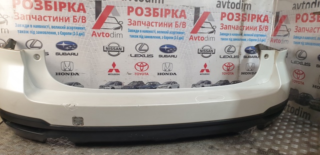 Бампер задній 57704SG010 SUBARU