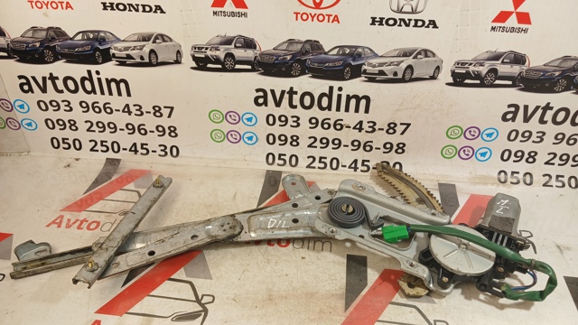 Мотор склопідйомника дверей передніх, лівих 61188AE010 SUBARU