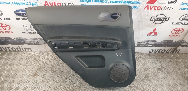 Обшивка лівих задніх дверей 82901JH00A NISSAN