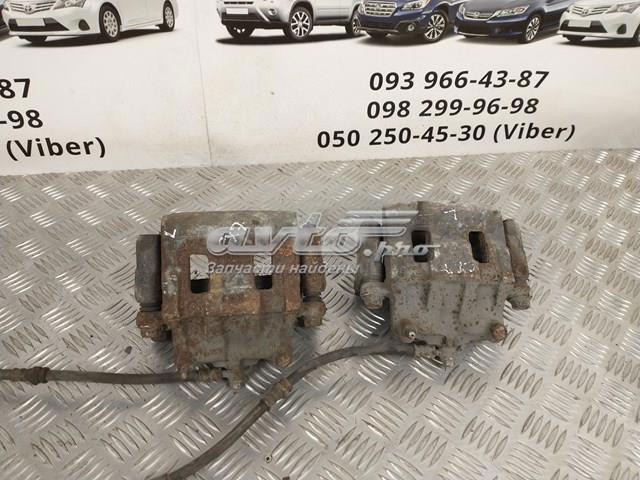 Супорт гальмівний, передній, лівий L20633990B MAZDA