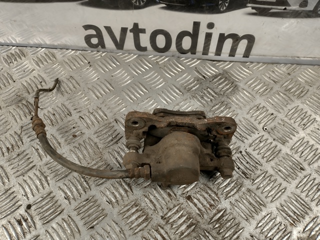 Задній гальмівний супорт лівий MR955065 MITSUBISHI