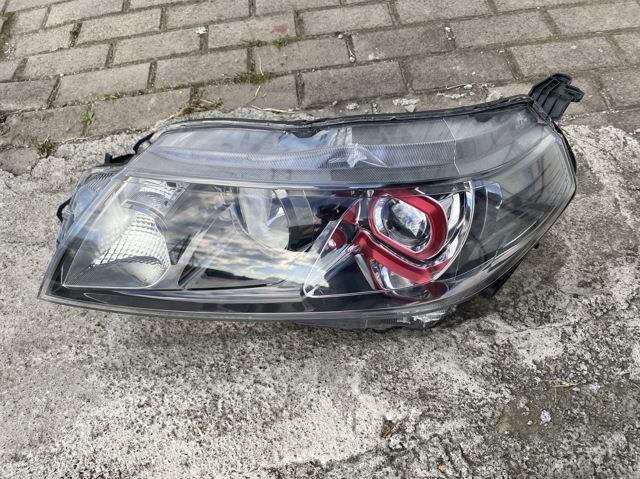 Основна фара в зборі ліва 3532054P00000 SUZUKI