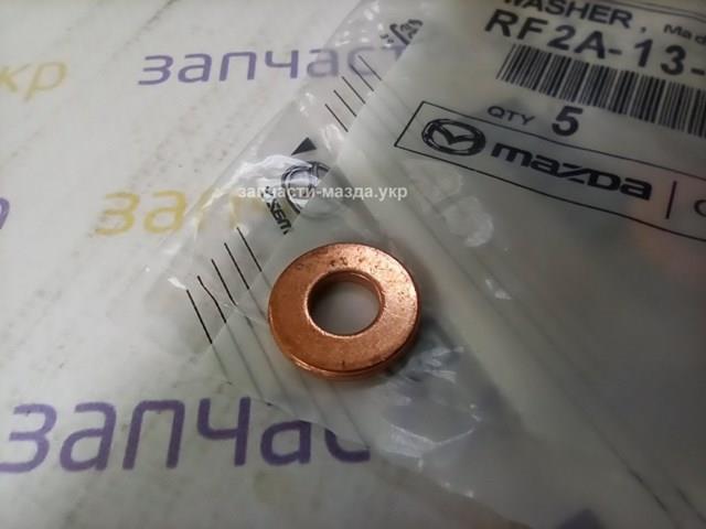 Кольцо форсунки инжектора посадочное mazda оригінал справжній. власна наявність. гарантована якість RF2A13H51B