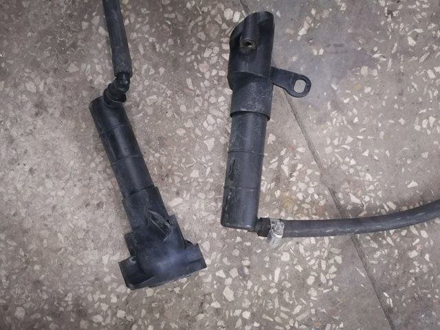 Тримач форсунки омивача фари, підйомний циліндр 30699229 VOLVO