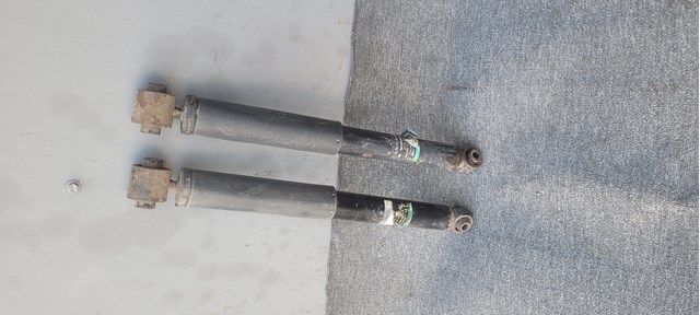 Амортизаційна стійка задня 56210JG02A NISSAN