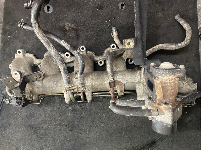 Колектор впускний 140018H810 NISSAN