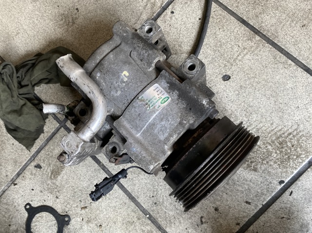 Насос кондиціонера 977012E200 HYUNDAI