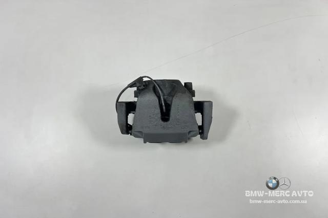 Супорт гальмівний, передній, лівий 34116776783 BMW