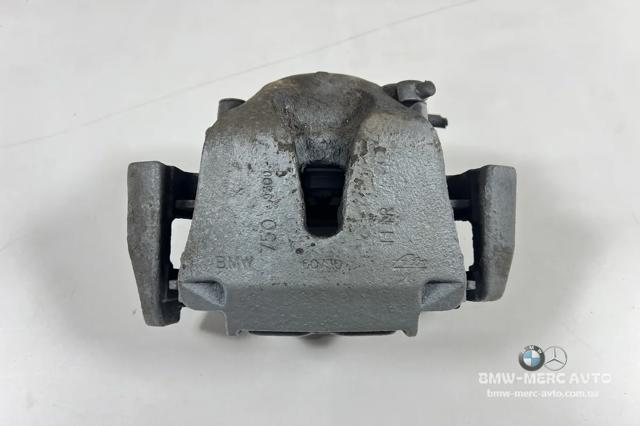 Супорт гальмівний, передній, правий 34116776784 BMW