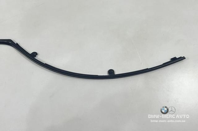 Ущільнювач двері задньої лівої (на двері) 7305545 BMW