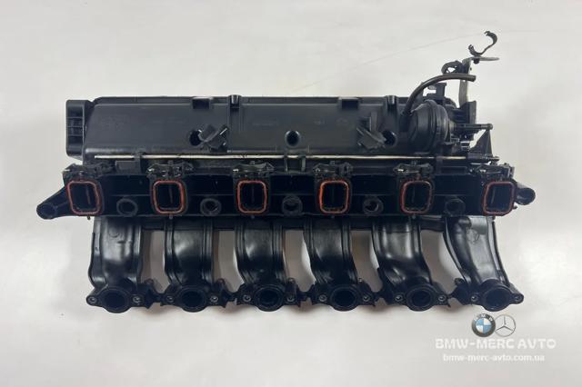 Колектор впускний 7790701 BMW