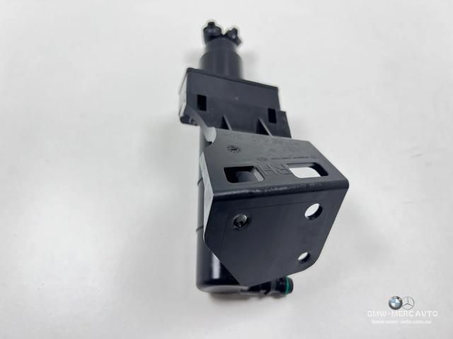 Тримач форсунки омивача фари, підйомний циліндр A1648600847 MERCEDES