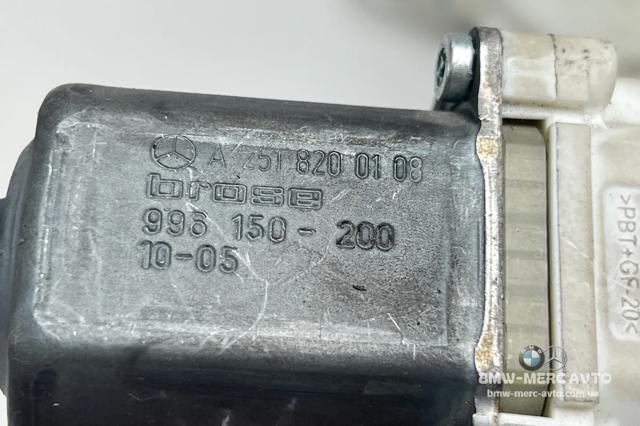 Двигун стеклопод'емника двері задньої, лівої A2518200108 MERCEDES