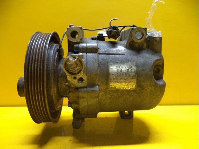 Компресор кліматичної установки 926002J204 NISSAN
