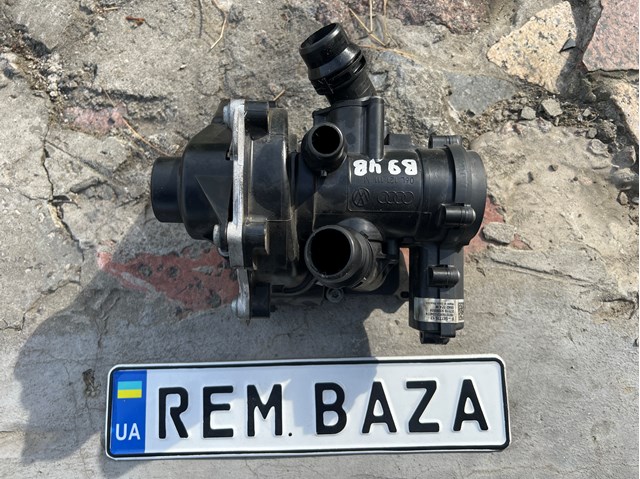 Термостат в зборі 06L121111M VAG