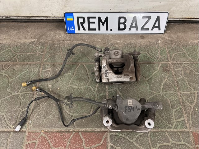 Супорт гальмівний, передній, правий 34116860264 BMW