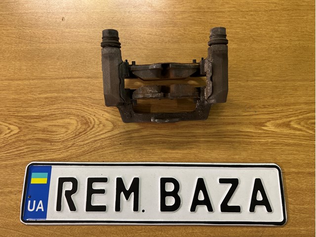 Скоба супорту заднього 34216865927 BMW