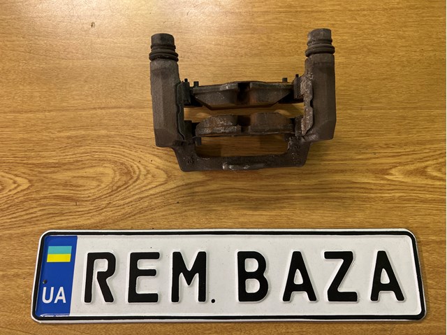 Скоба гальмівного заднього супорта 34216865928 BMW