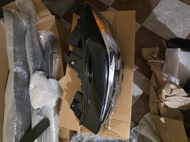 Фара KT4Z13008AW FORD