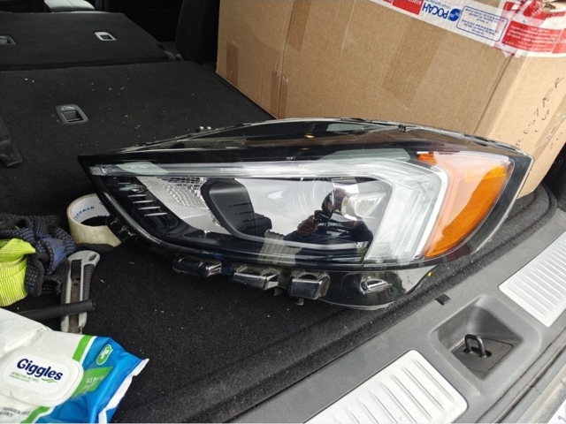 Фара передня права KT4Z13008AX FORD