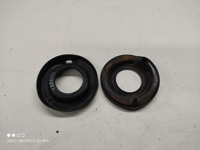 Проставка (гумове кільце) пружини задньої, нижня 4M515599AA FORD