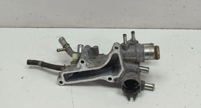 Корпус термостата в зборі 1932059B000 HONDA