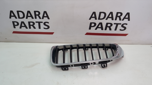 Решітка радіатора ліва 51135A3D025 BMW