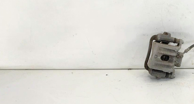 Супорт гальмівний задній правий 582304Z700 HYUNDAI
