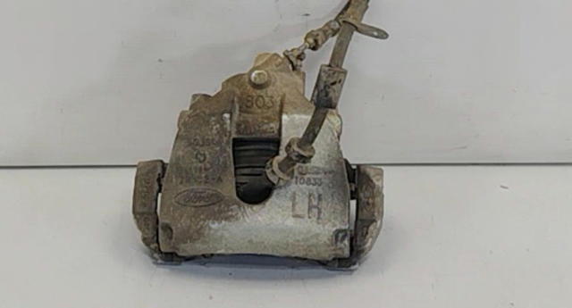 Супорт гальмівний, передній, лівий BV6Z2B121A FORD