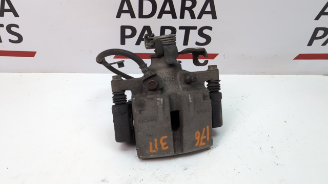 Супорт гальмівний задній правий FR3Z2552J FORD