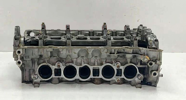 Головка циліндрів PE0110100C MAZDA