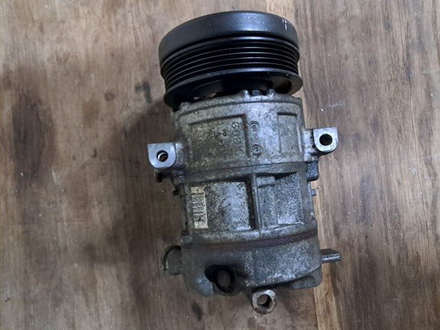 Компресор кондиціонера 55701200 GM