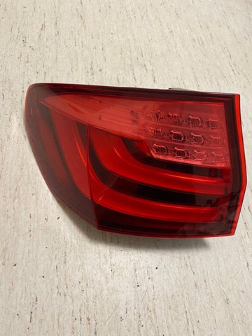 Ліхтар задній лівий, зовнішній 63217203233 BMW