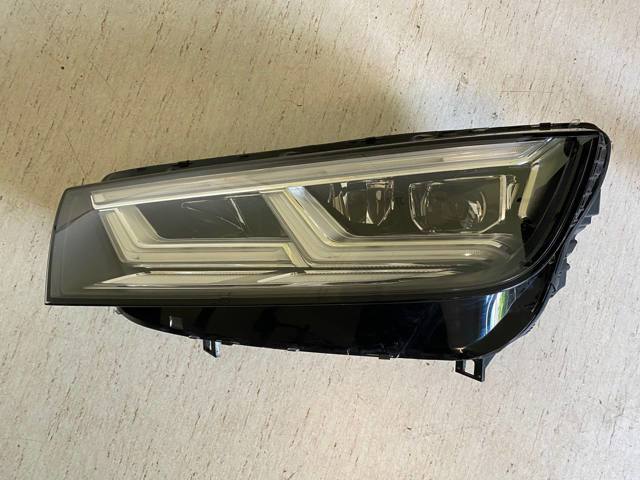 Фара ліва 80A941033 VAG