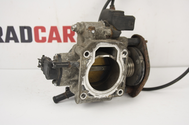 Дросільна заслінка в зборі 351002B020 HYUNDAI