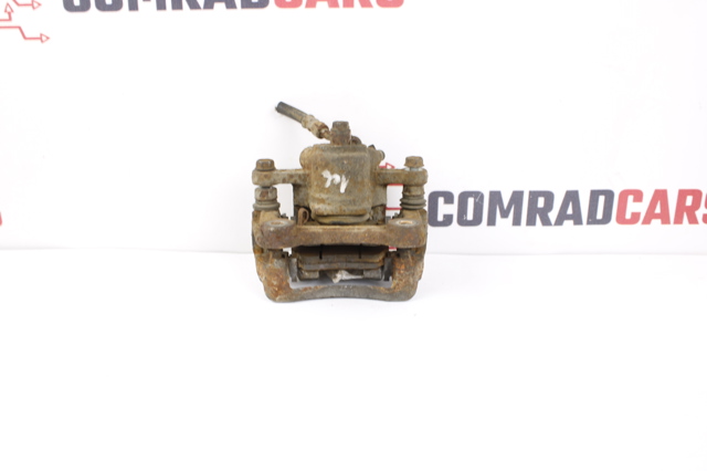Супорт гальмівного, заднього 582102T600 HYUNDAI