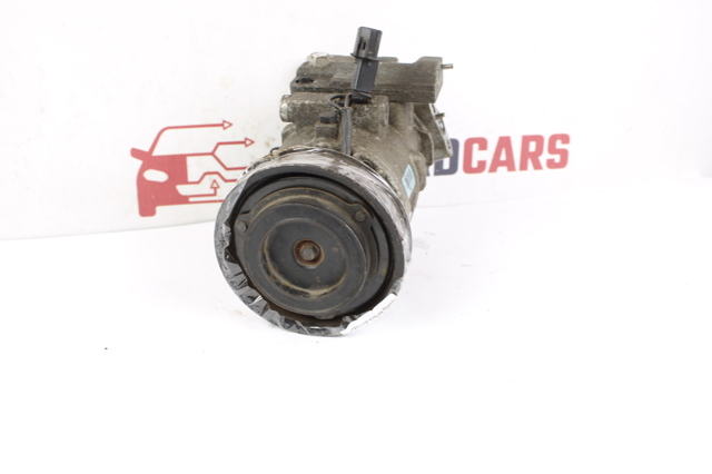 Компресор кліматичної установки 977011R000 HYUNDAI