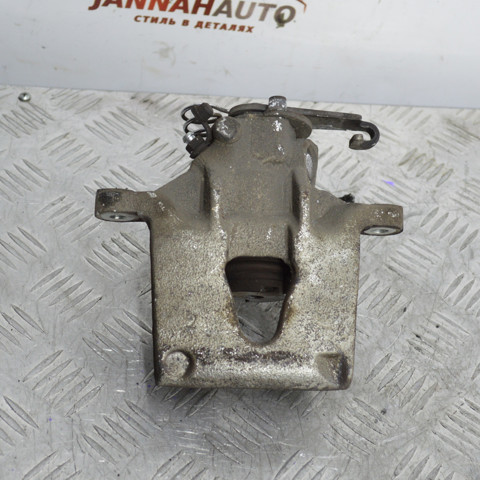 Супорт гальмівний задній правий 7701208037 RENAULT