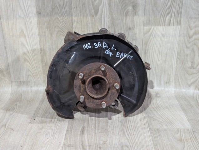 Цапфа - поворотний кулак задній, лівий GHP92612X MAZDA