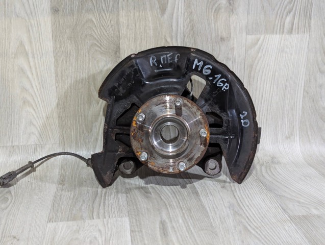 Кулак поворотний передній правий GHP933021A MAZDA