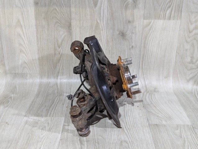Цапфа поворотна ліва GHP933031A MAZDA