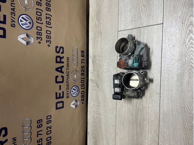 Дросільна заслінка в зборі 03C133062D VAG