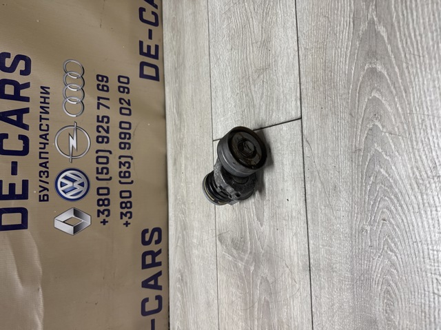 Натягувач приводного ременя 03C145299AC VAG