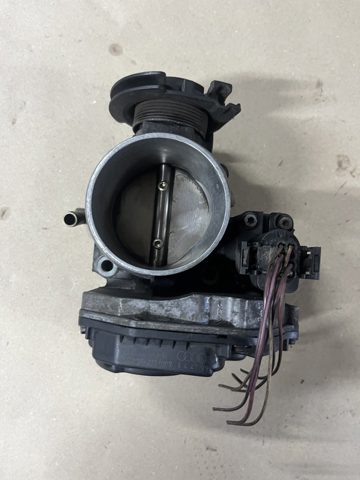Дросільна заслінка в зборі 06A133063G VAG