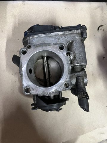 Блок дросельної заслінки 06A133064J VAG