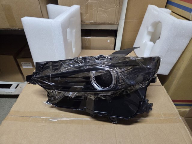 Фара основна права DFR551030E MAZDA