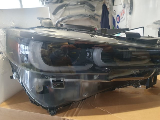 Блок фара ліва KPF351041C MAZDA