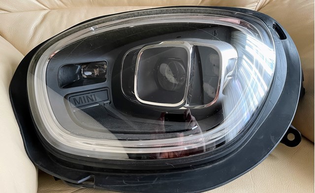 Основна фара в зборі ліва 63115A3BD77 BMW