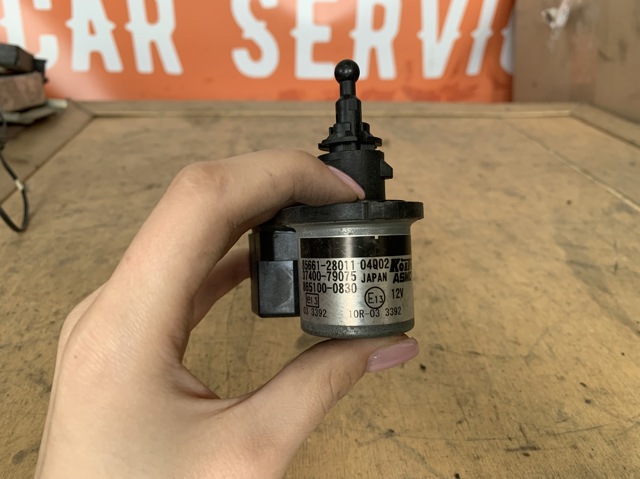 Двигун корректора фари 8566128011 TOYOTA